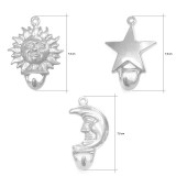 Tris di Ganci appendino in ottone naturale a forma di Luna, sole e Stella